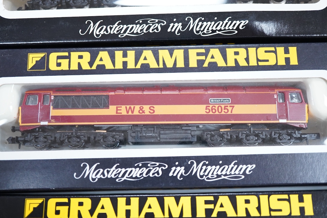 Four boxed Graham Farish N gauge railway class 56 diesel locomotives; a Load Haul, 56055, (805D), an EWS, British Fuels 56057 (805E), a Coal Sector, 56 092, (8057) and a Construction Sector, 56 059 (8056).